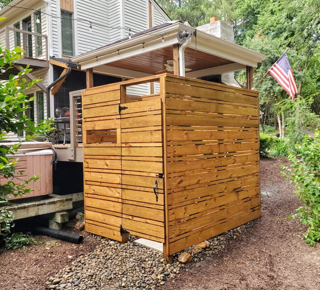 Custom outdoor living structure and privacy wall built for a backyard in Wake County, NC